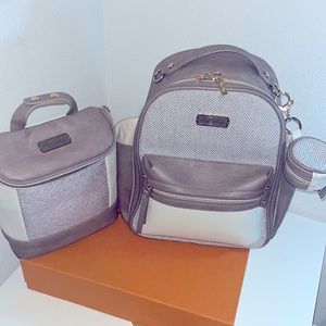 Itzy Ritzy diaper bag with pacifier storage and bottle bag.